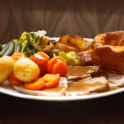 Roast dinner at lunch club for elderly